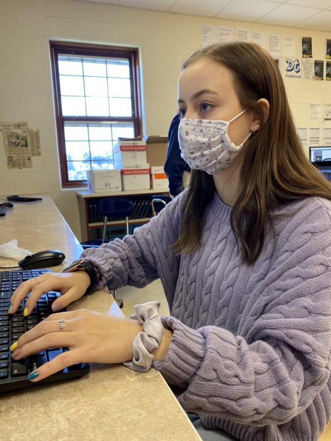 Senior Ruth Hayward works in teacher Julie Headricks yearbook class.  On her Blue schedule day, 12 other students are in this class with Hayward.