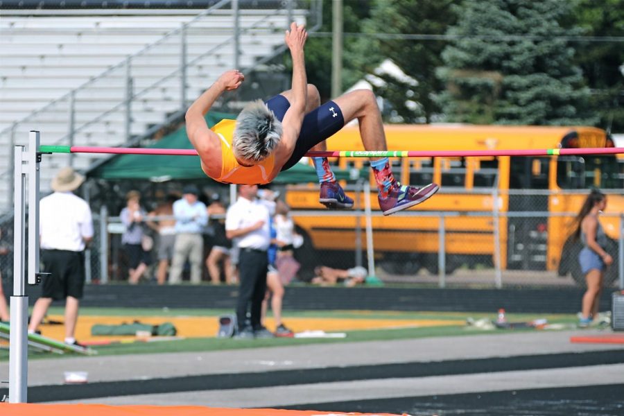 Junior Riley Murphy completes his high jump at a recent meet. 